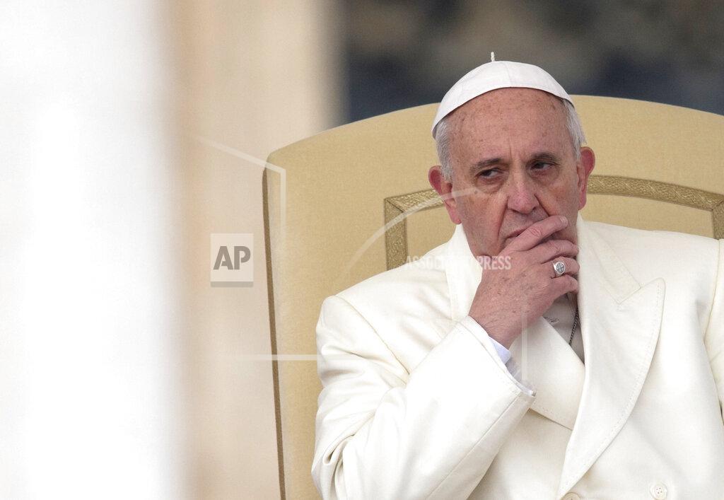 Alessandra Tarantino FILE -- Pope Francis attends his weekly general audience in St. Peter's Square at the Vatican, Wednesday, Jan. 22, 2014. The Vatican’s sprawling financial trial may not have produced any convictions yet or any new smoking guns. But recent testimony in May 2022 has provided plenty of insights into how the Vatican operates. (AP Photo/Alessandra Tarantino, File)