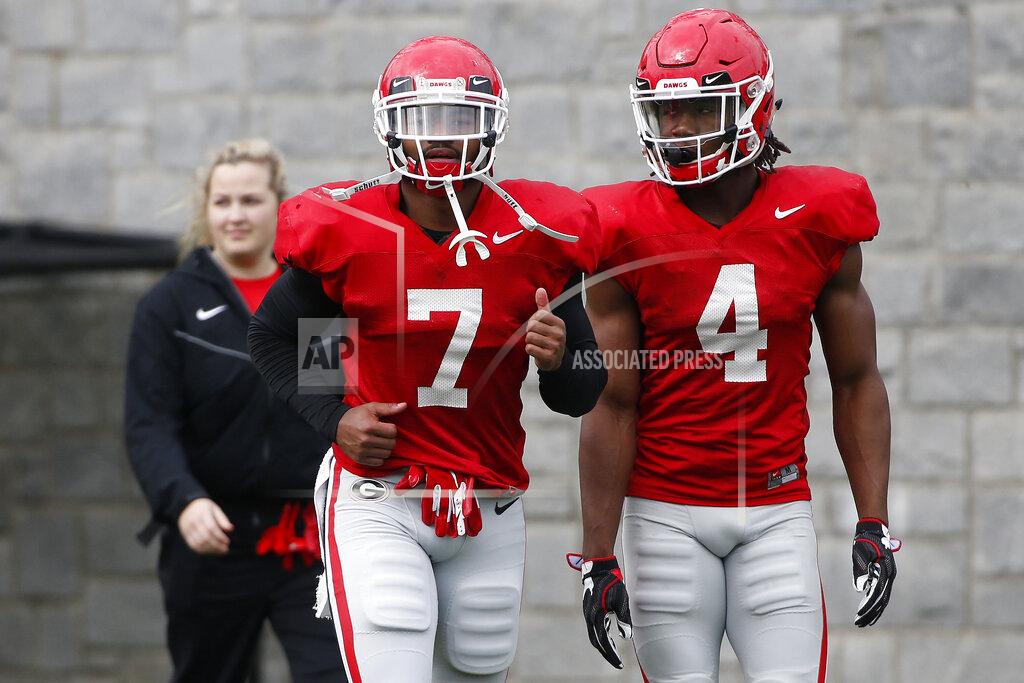Joshua L. Jones Georgia running back D'Andre Swift (7) and Georgia running back James Cook (4) at an NCAA football spring practice in Athens, Ga., Tuesday, March 26, 2019. (Joshua L. Jones/Athens Banner-Herald via AP)