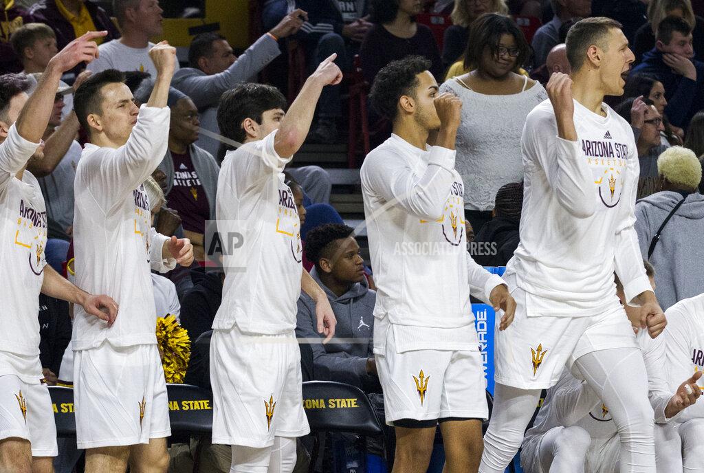 Darryl Webb Arizona State players on the bench cheer on their team during the first half of an NCAA college basketball game against Oregon, Saturday, Jan. 19, 2019, in Tempe, Ariz. (AP Photo/Darryl Webb)