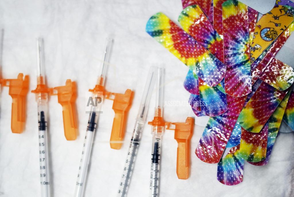 Ben Garver FILE - Syringes and colorful bandages are prepared as children from local schools prepare to get COVID-19 vaccines in Pittsfield, Mass., on Monday Dec. 13, 2021. Three doses of Pfizer’s COVID-19 vaccine offer strong protection for children younger than 5, the company announced Monday, May 23, 2022. Pfizer plans to give the data to U.S. regulators later this week in a step toward letting the littlest kids get the shots. (Ben Garver/The Berkshire Eagle via AP, File)