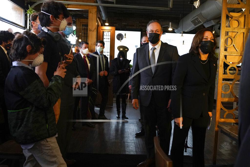 Jacquelyn Martin Vice President Kamala Harris and her husband Doug Emhoff arrive at Maria Empanada, Tuesday March 16, 2021, in Denver. (AP Photo/Jacquelyn Martin)