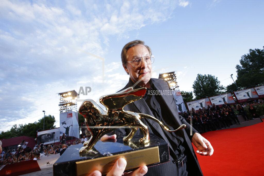 Andrew Medichini File - Director William Friedkin holds his Golden Lion for Lifetime Achievement award at the Venice Film Festival. The 77th Venice Film Festival will kick off on Wednesday, Sept. 2, 2020, but this year's edition will be unlike any others. Coronavirus restrictions will mean fewer Hollywood stars, no crowds interacting with actors and other virus safeguards will be deployed. (AP Photo/Andrew Medichini, File)