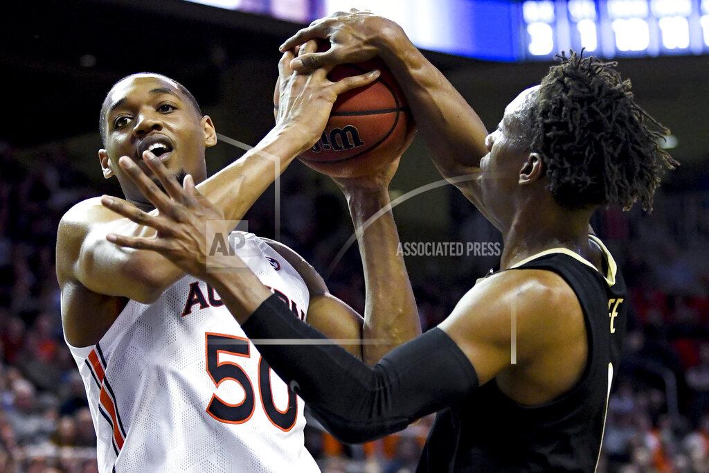 Julie Bennett Auburn center Austin Wiley (50) and Vanderbilt guard Saben Lee (0) go for a rebound during the second half of an NCAA college basketball game Wednesday, Jan. 8, 2020, in Auburn, Ala. (AP Photo/Julie Bennett)