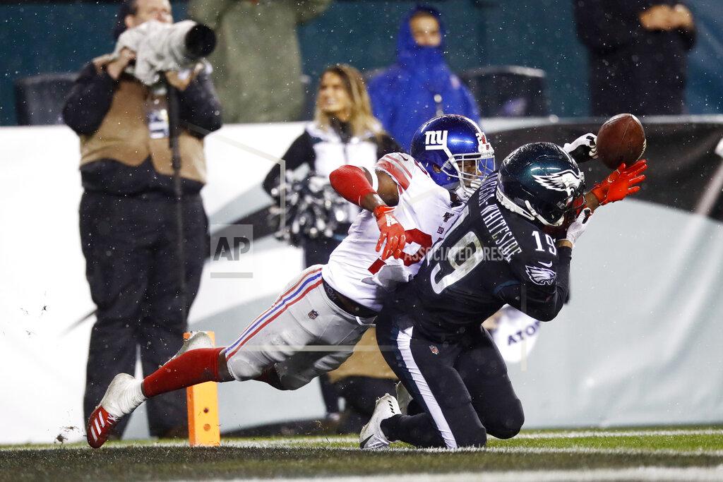 Matt Rourke FILE - New York Giants' Deandre Baker, left, breaks up a pass intended for Philadelphia Eagles' J.J. Arcega-Whiteside during the second half of an NFL football game,in a Monday, Dec. 9, 2019 file photo, in Philadelphia. New York Giants cornerback DeAndre Baker, Seattle Seahawks cornerback Quinton Dunbar and Washington receiver Cody Latimer have been put on the NFL's Commissioner Exempt List while facing felony charges from offseason incidents. (AP Photo/Matt Rourke, File)