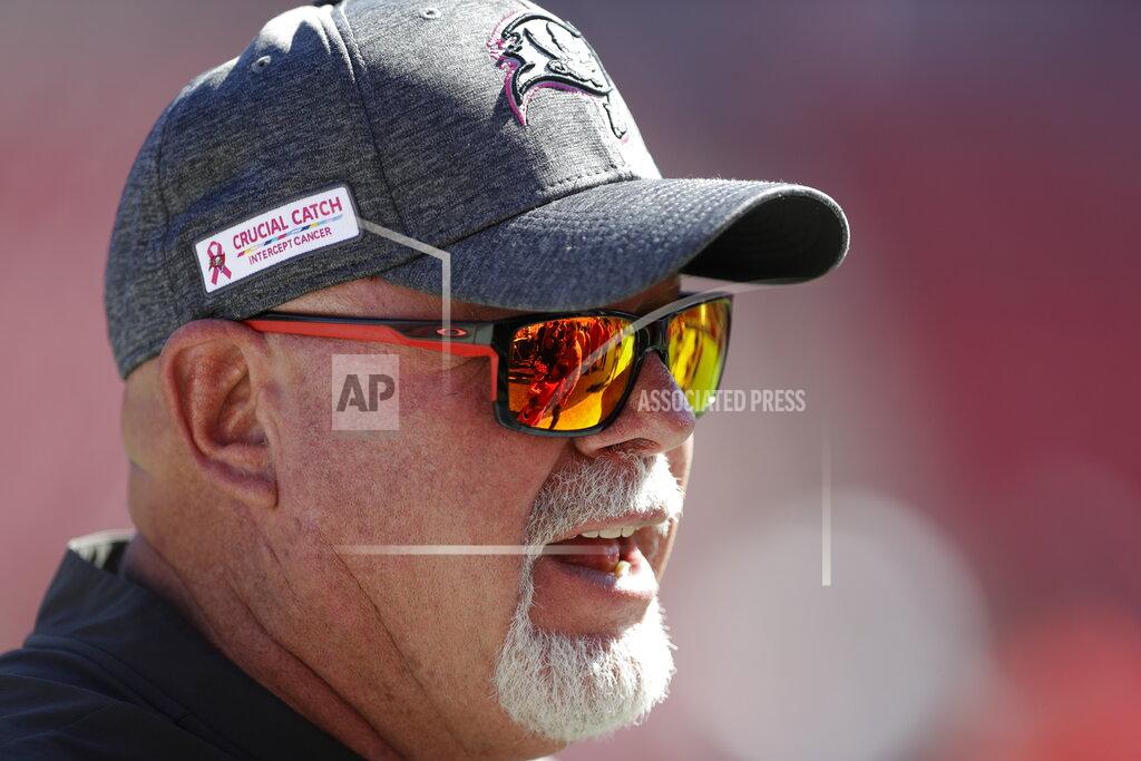 Chris O'meara FILE - This Nov. 10, 2019, file photo shows Tampa Bay Buccaneers head coach Bruce Arians wearing a "Crucial Catch" hat before an NFL football game against the Arizona Cardinals in Tampa, Fla. The NFL is planning to allow players to have decals on the back of their helmets bearing names or initials of victims of systemic racism and police violence. The league has been in talks with individual players and their union since June about somehow honoring such victims.(AP Photo/Chris O'Meara, File)