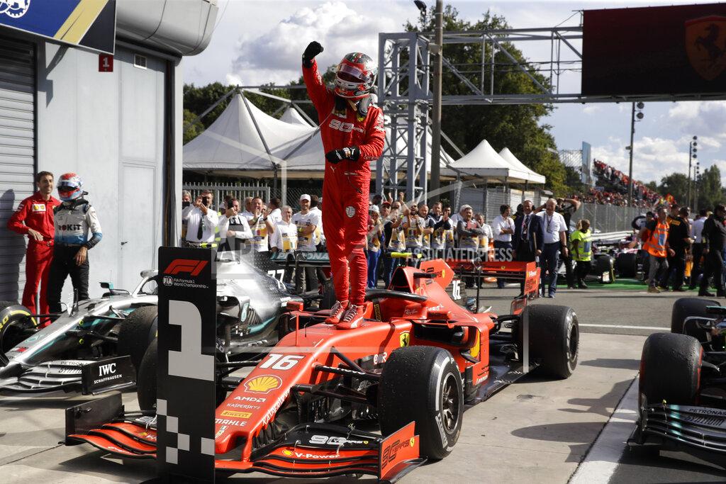 Ferrari driver Charles Leclerc of Monaco celebrates after winning the Formula One Italy Grand Prix at the Monza racetrack, in Monza, Italy, Sunday, Sept. 8, 2019. (AP Photo/Luca Bruno)
