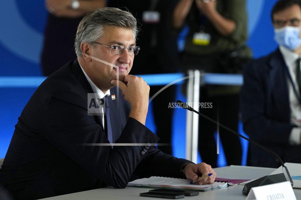 Thanassis Stavrakis Croatian Prime Minister Andrej Plenkovic attends the EUMED 9 summit at the Stavros Niarchos Foundation Cultural Center in Athens, Friday, Sept. 17, 2021. Nine European countries on the Mediterranean are holding a summit in Athens to discuss issues ranging from climate change and the pandemic response to migration and Afghanistan. (AP Photo/Thanassis Stavrakis)
