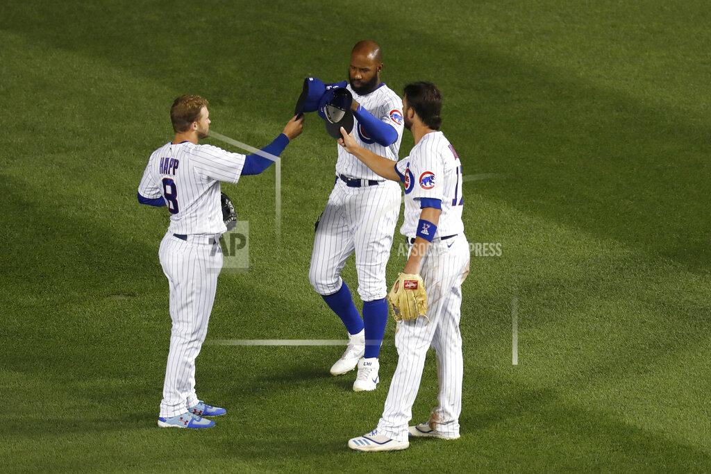 Charles Rex Arbogast Chicago Cubs outfielders Ian Happ, Jason Heyward and Kris Bryant, from left, celebrate the team's 2-0 win over the Kansas City Royals in a baseball game Monday, Aug. 3, 2020, in Chicago. (AP Photo/Charles Rex Arbogast)