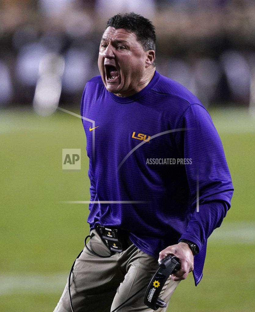 David J. Phillip LSU coach Ed Oregon yells at the officials during overtime of an NCAA college football game against Texas A&M Saturday, Nov. 24, 2018, in College Station, Texas. Texas A&M won 74-72 in seven overtimes.(AP Photo/David J. Phillip)