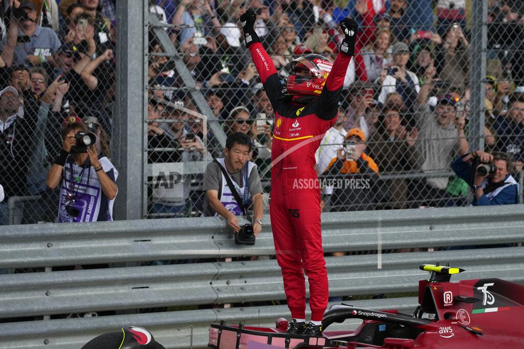 Matt Dunham Ferrari driver Carlos Sainz of Spain celebrates after winning the British Formula One Grand Prix at the Silverstone circuit, in Silverstone, England, Sunday, July 3, 2022. (AP Photo/Matt Dunham)