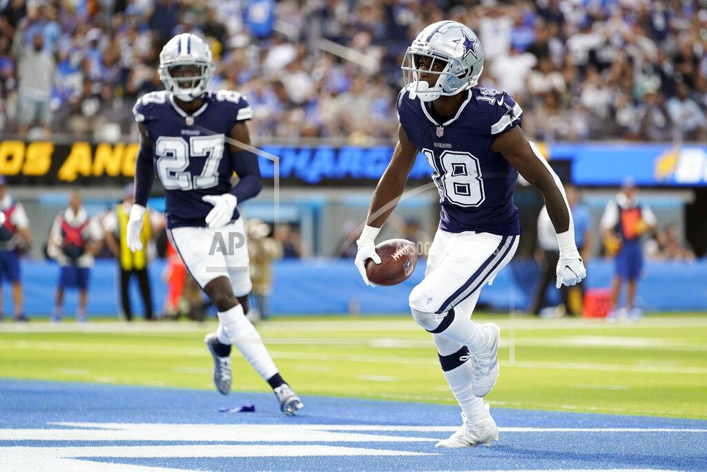 Ashley Landis Dallas Cowboys strong safety Damontae Kazee, right, celebrates after intercepting a pass during the second half of an NFL football game against the Los Angeles Chargers Sunday, Sept. 19, 2021, in Inglewood, Calif. (AP Photo/Ashley Landis)