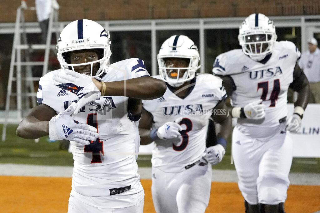 Charles Rex Arbogast UTSA's Zakhari Franklin, left, celebrates his touchdown reception during the second half of an NCAA college football game against Illinois, Saturday, Sept. 4, 2021, in Champaign, Ill. (AP Photo/Charles Rex Arbogast)