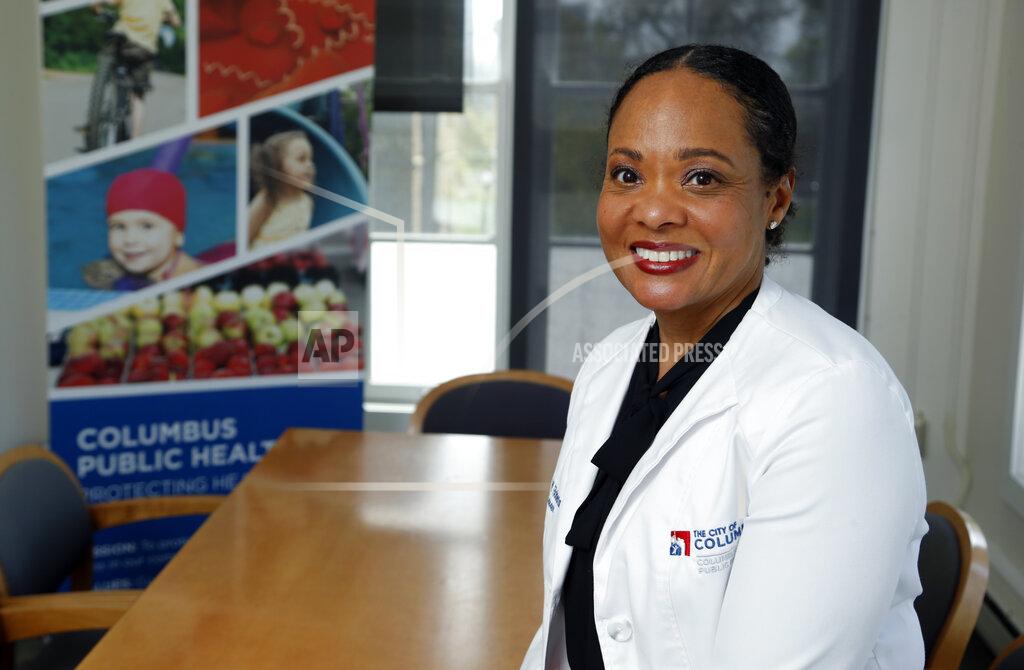 Paul Vernon Dr. Mysheika W. Roberts, the health commissioner for Columbus Public Health, poses for a portrait in Columbus, Ohio, on Wednesday, April 14, 2021. Public health officials who have juggled bare-bones budgets for years are happy to have the additional money prompted by the COVID-19 pandemic. Yet they worry it will soon dry up as the pandemic recedes, continuing a boom-bust funding cycle that has plagued the U.S. public health system for decades. If budgets are slashed again, they warn, that could leave the nation where it was before covid: unprepared for a health crisis. “We need funds that we can depend on year after year,” says Roberts. (AP Photo/Paul Vernon)