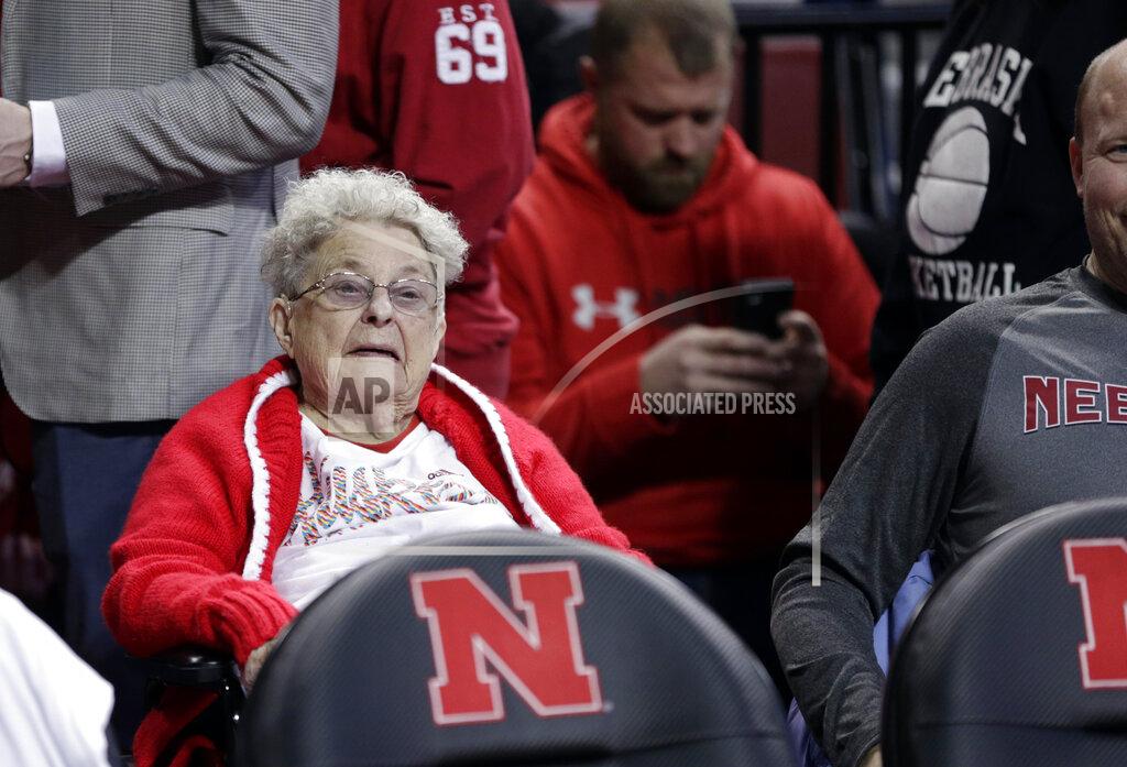 Nati Harnik 98-year-old Florence Dalby follows an NCAA college basketball game between Ohio State and Nebraska in Lincoln, Neb., Saturday, Jan. 26, 2019. Dalby is a University of Nebraska Lincoln graduate and has had a men's basketball season ticket for more than 80 years. Dalby loves Nebraska as much today as she did when she first started going to games in 1939. The Cornhuskers honored her during their Coaches Vs. Cancer game against Ohio State. (AP Photo/Nati Harnik)