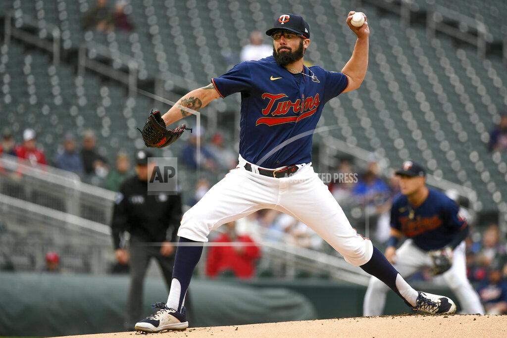 Craig Lassig Minnesota Twins pitcher Devin Smeltzer throws to a Kansas City Royals batter during the first inning of a baseball game Thursday, May 26, 2022, in Minneapolis. (AP Photo/Craig Lassig)
