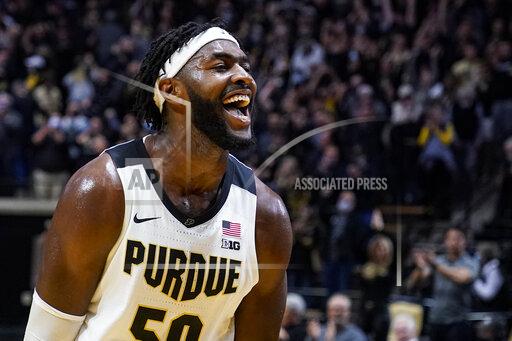 Purdue forward Trevion Williams celebrates after the team's 77-70 win over Iowa in an NCAA college basketball game in West Lafayette, Ind., Friday, Dec. 3, 2021. (AP Photo/Michael Conroy)