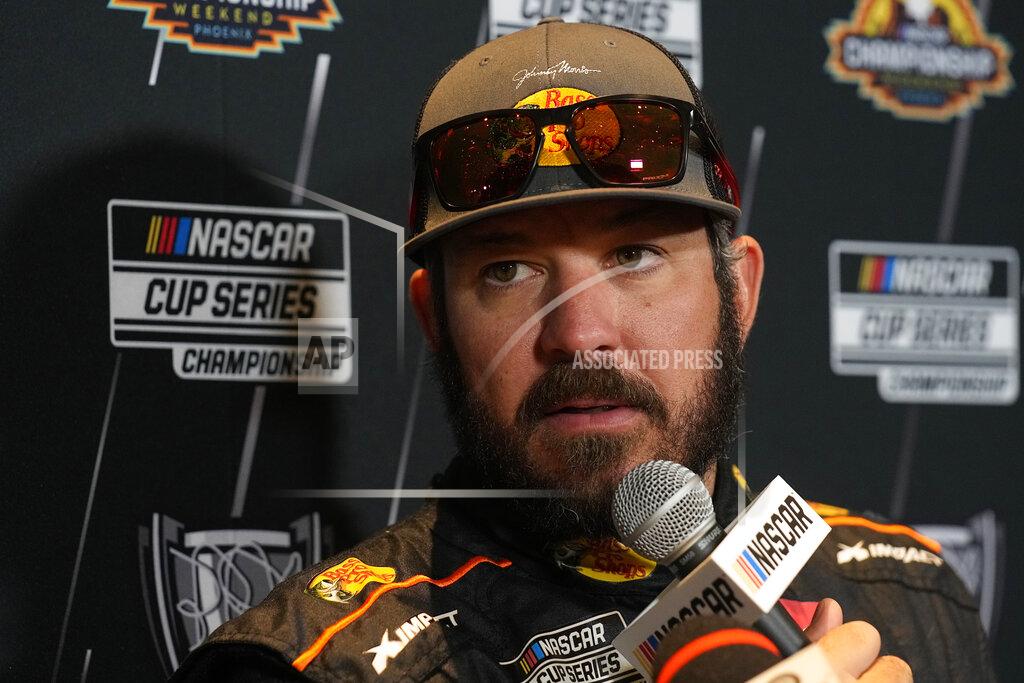 Rick Scuteri Driver Martin Truex Jr. speaks during media day ahead of Sunday's NASCAR Cup Series championship auto race on Thursday, Nov. 4, 2021, in Phoenix. (AP Photo/Rick Scuteri)