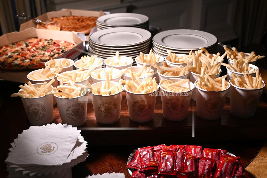 Susan Walsh French fries and pizza are some of the fast food items for the reception for the Clemson Tigers in the State Dining Room of the White House in Washington, Monday, Jan. 14, 2019. (AP Photo/Susan Walsh)