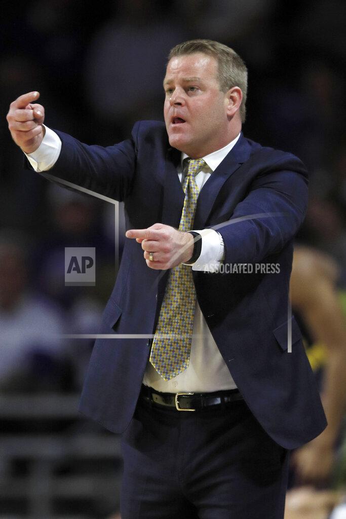 Orlin Wagner Marquette head coach Steve Wojciechowski calls for a switch during the first half of an NCAA college basketball game against Kansas State in Manhattan, Kan., Saturday, Dec. 7, 2019. (AP Photo/Orlin Wagner)