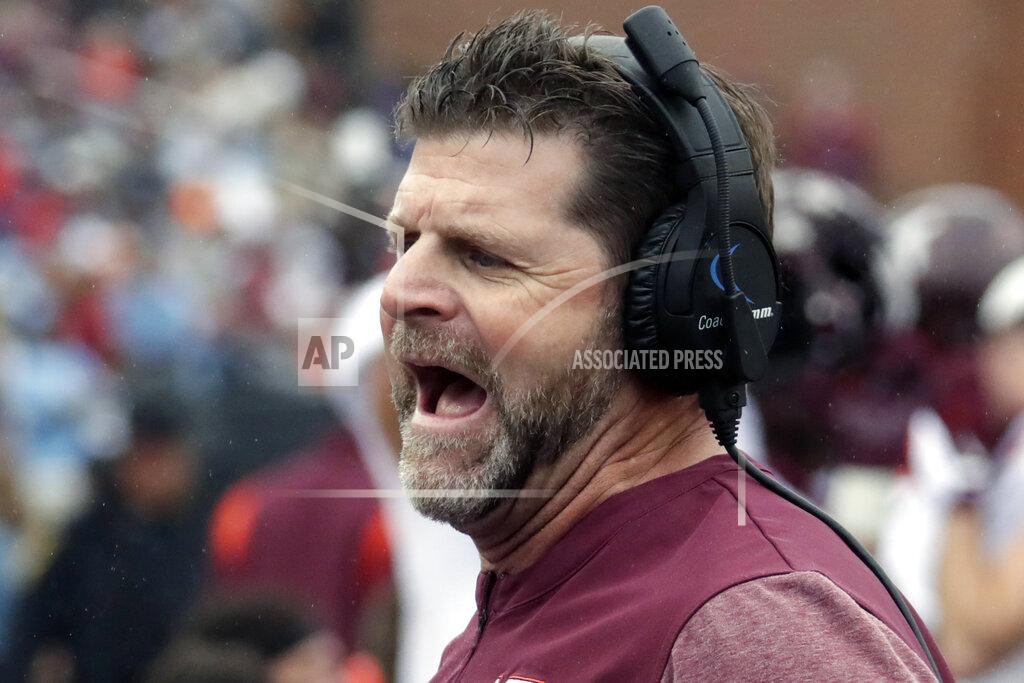 Chris Seward Virginia Tech head coach Brent Pry directs the team during the first half of an NCAA college football game against North Carolina in Chapel Hill, N.C., Saturday, Oct. 1, 2022. (AP Photo/Chris Seward)