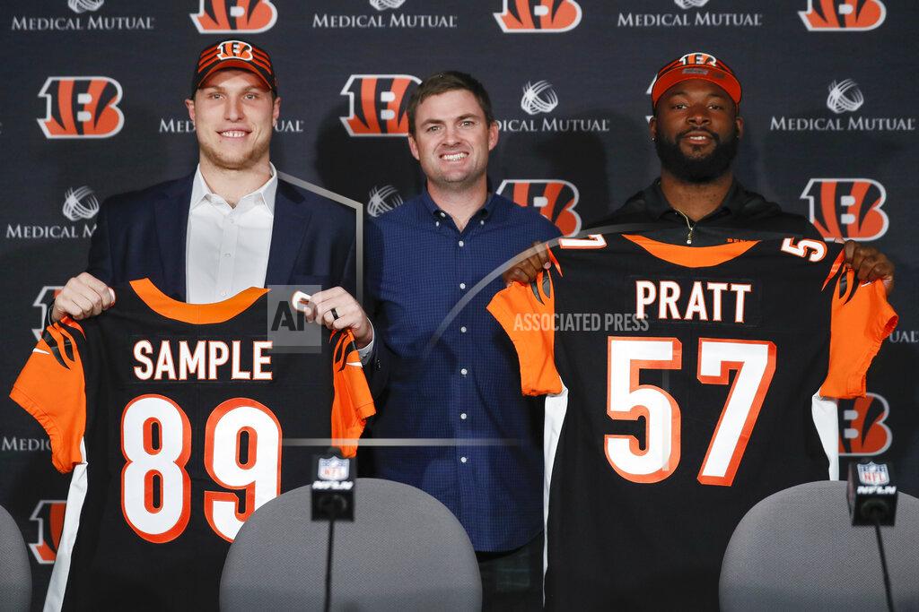 John Minchillo From left, Cincinnati Bengals football second round NFL draft pick Drew Sample, head coach Zac Taylor, and third round draft pick Germaine Pratt pose for a photograph during a news conference at Paul Brown Stadium, Saturday, April 27, 2019, in Cincinnati. (AP Photo/John Minchillo)