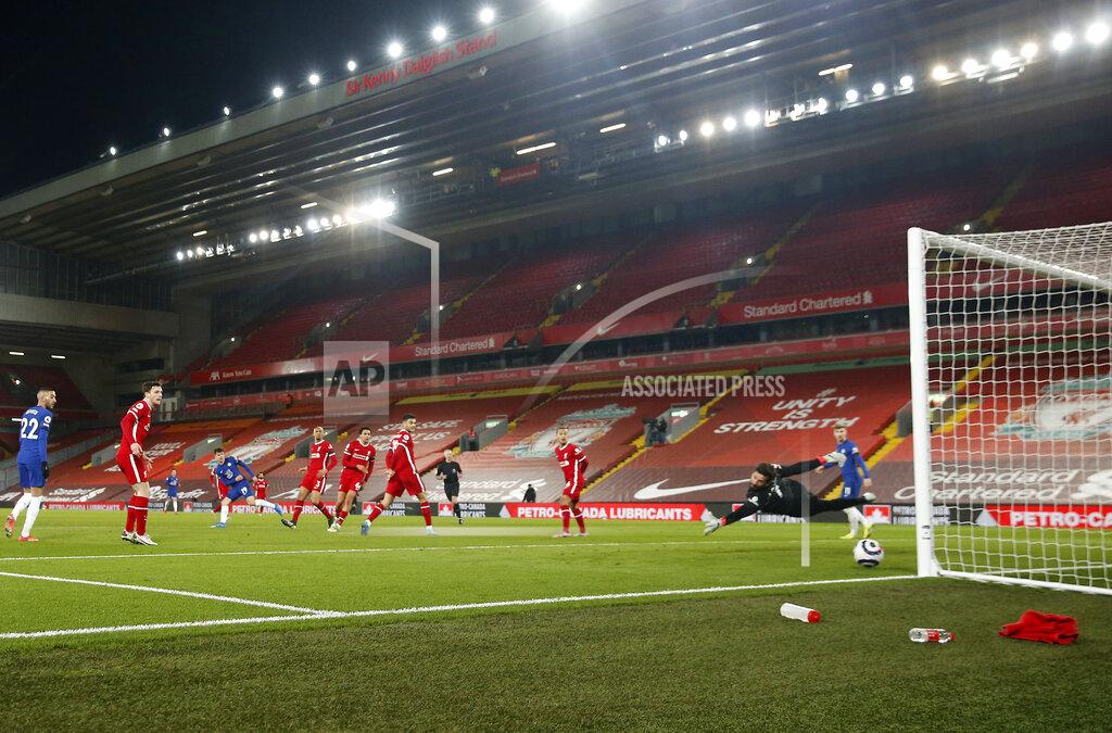Phil Noble Chelsea's Mason Mount, third from left, scores his side's opening goal during the English Premier League soccer match between Liverpool and Chelsea at Anfield stadium in Liverpool, England, Thursday, March 4, 2021. (Phil Noble, Pool via AP)