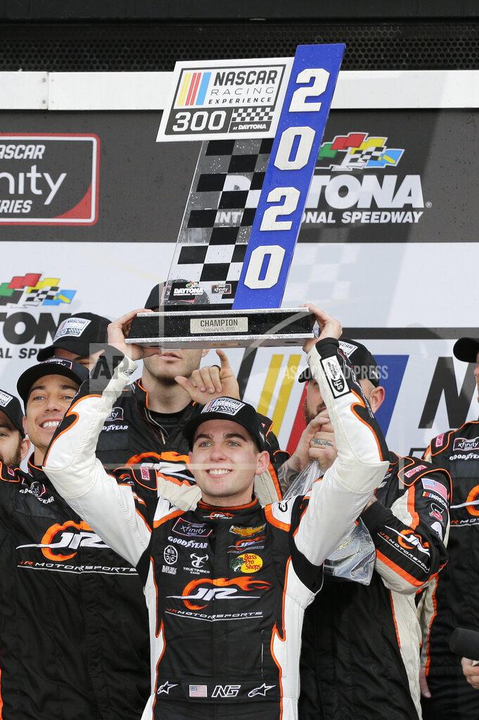 Terry Renna Noah Gragson holds up the trophy after winning the NASCAR Xfinity series auto race at Daytona International Speedway, Saturday, Feb. 15, 2020, in Daytona Beach, Fla. (AP Photo/Terry Renna)