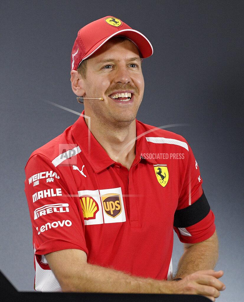 Andy Brownbill Sebastian Vettel of Germany smiles as he attends a press conference after qualifying for the Australian Grand Prix in Melbourne, Australia, Saturday, March 16, 2019. Vettel is third place on the grid for the first race of the year, Sunday. (AP Photo/Andy Brownbill)