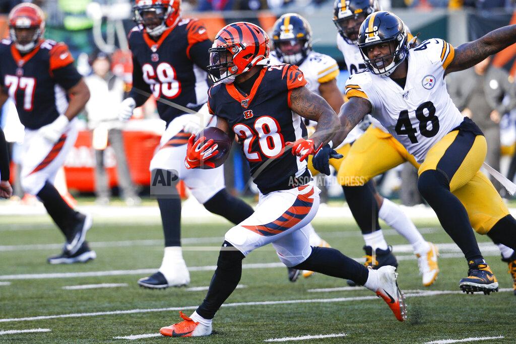 Frank Victores Cincinnati Bengals running back Joe Mixon (28) runs the ball past Pittsburgh Steelers outside linebacker Bud Dupree (48) during the second half an NFL football game, Sunday, Nov. 24, 2019, in Cincinnati. (AP Photo/Frank Victores)