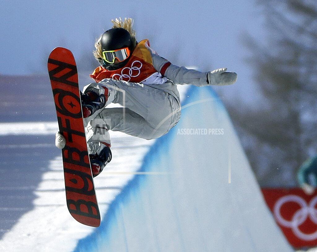 Gregory Bull FILE- In this Feb. 13, 2018, file photo, Chloe Kim, of the United States, jumps during the women's halfpipe finals at Phoenix Snow Park at the 2018 Winter Olympics in Pyeongchang, South Korea. Chloe Kim took some time off to heal her body and broaden her mind. Mission(s) accomplished, and now that she's back at her day job — best female athlete in the halfpipe — it looks as though she never left. Now 20 and with a year at Princeton under her belt, the Olympic champion is in the lineup for the Winter X Games, going for her fifth gold medal on the superpipe in Aspen on Saturday night, Jan. 30, 2021. (AP Photo/Gregory Bull, File)
