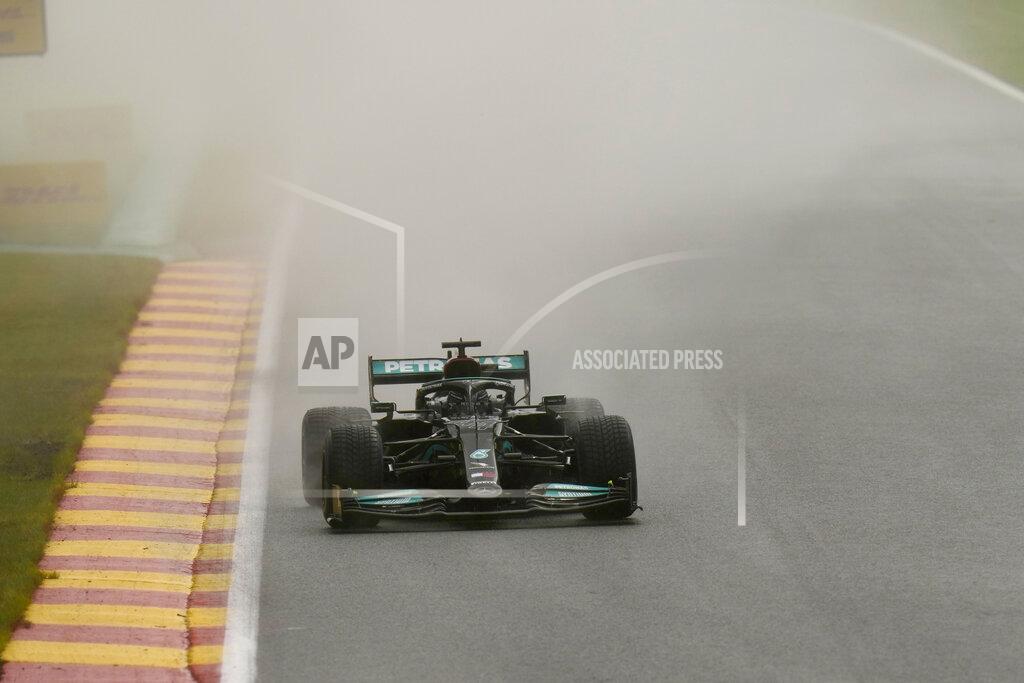 Francisco Seco Mercedes driver Lewis Hamilton of Britain steers his car during qualification ahead of the Formula One Grand Prix at the Spa-Francorchamps racetrack in Spa, Belgium, Saturday, Aug. 28, 2021. The Belgian Formula One Grand Prix will take place on Sunday. (AP Photo/Francisco Seco)
