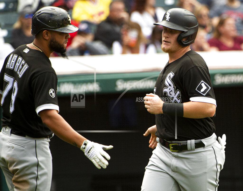 Phil Long Chicago White Sox's Jose Abreu greets Andrew Vaughn after Vaughn scored on a single by Leury Garcia during the sixth inning of a baseball game in Cleveland, Sunday, Sept. 26, 2021. (AP Photo/Phil Long)