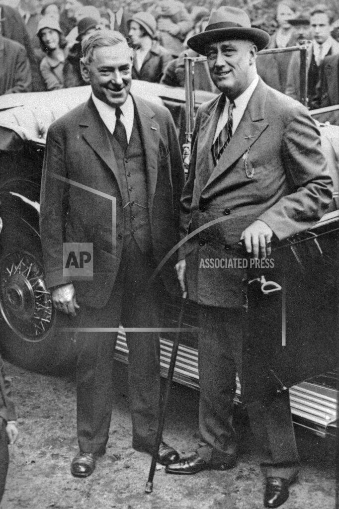 Uncredited FILE - In this Oct. 30, 1932 file photo, Boston Mayor James M. Curley, left, stands with then-Democratic presidential candidate Franklin D. Roosevelt during a presidential campaign stop in Groton, Mass. Curley, the real-life Irish-American city boss, was elected mayor four times between 1914 and 1946. Boston is facing a historic political pivot with the expected departure of Mayor Marty Walsh to become President Joe Biden's labor secretary. (AP Photo, File)
