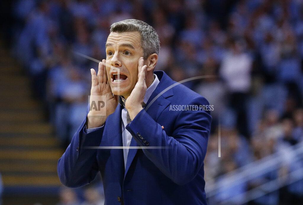 Gerry Broome Virginia head coach Tony Bennett directs his players during the first half of an NCAA college basketball game against North Carolina in Chapel Hill, N.C., Monday, Feb. 11, 2019. (AP Photo/Gerry Broome)