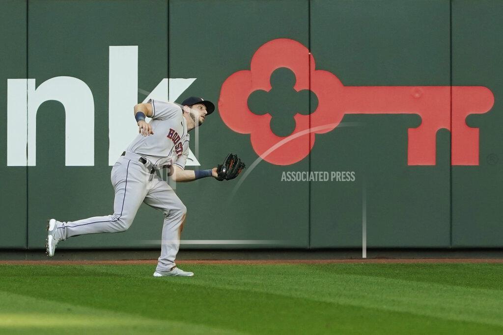 Ted S. Warren Houston Astros right fielder Kyle Tucker catches a fly ball hit by Seattle Mariners' Dylan Moore during the third inning of a baseball game Saturday, April 17, 2021, in Seattle. (AP Photo/Ted S. Warren)