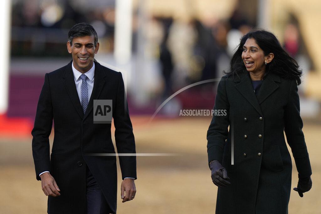 Alastair Grant FILE - Britain's Prime Minister Rishi Sunak, left, and Suella Braverman the Home Secretary after attending the Ceremonial Welcome for the President of South Africa Cyril Ramaphosa at Horse Guards Parade in London, Nov. 22, 2022. In his first month as Britain's prime minister, Sunak has stabilized the economy, reassured allies from Washington to Kyiv and even soothed the European Union after years of sparring between Britain and the bloc. But Sunak’s challenges are just beginning. He is facing a stagnating economy, a cost-of-living crisis – and a Conservative Party that is fractious and increasingly unpopular after 12 years in power. (AP Photo/Alastair Grant, File)