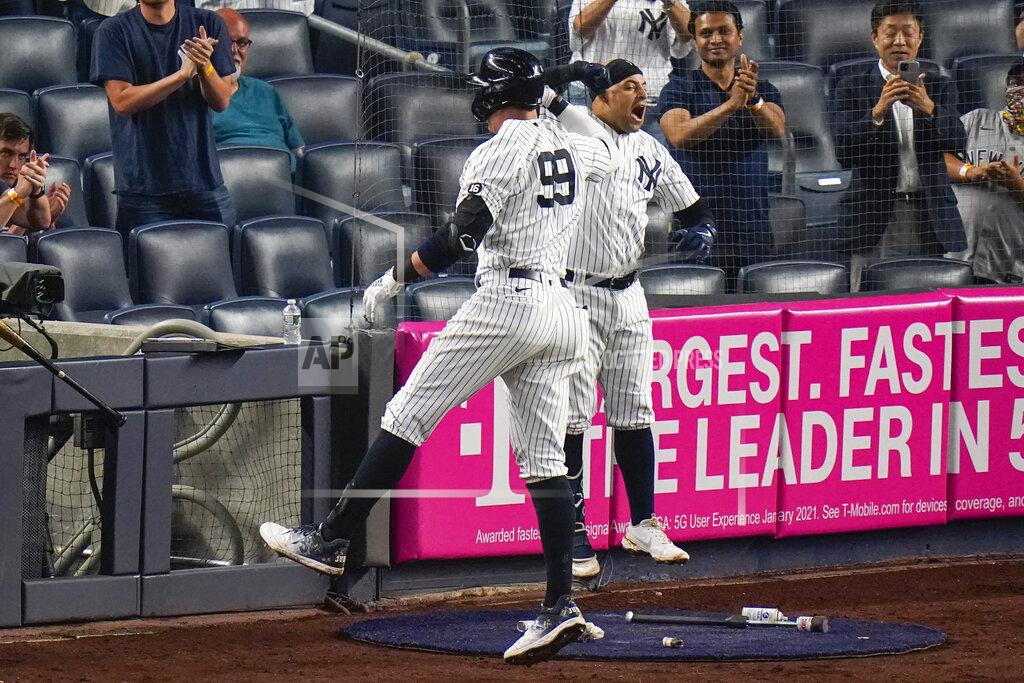 Frank Franklin Ii New York Yankees' Aaron Judge (99) celebrates with teammate Rougned Odor after hitting a home run during the sixth inning of a baseball game against the Boston Red Sox, Friday, June 4, 2021, in New York. (AP Photo/Frank Franklin II)