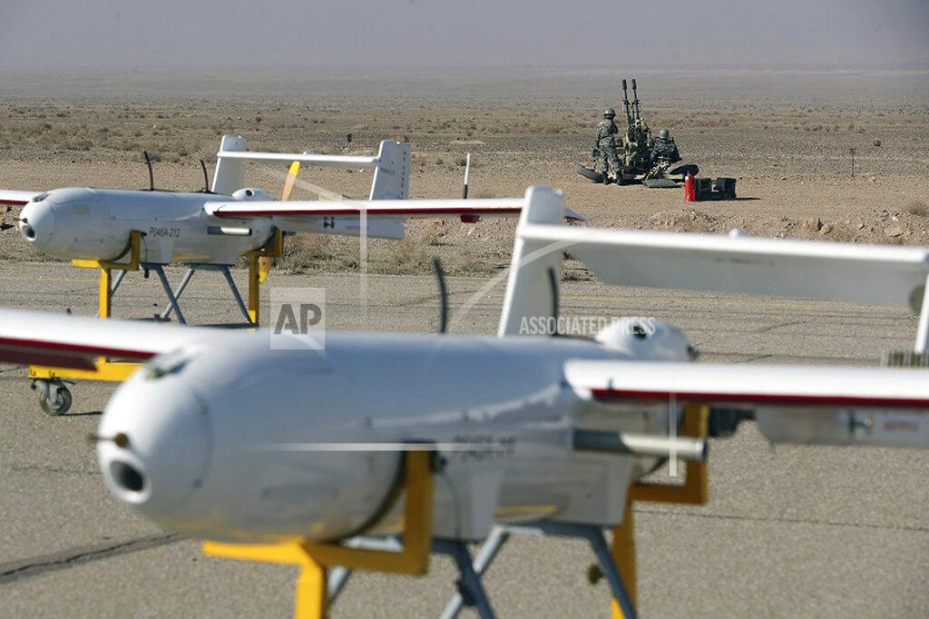 Uncredited In this undated photo released on Monday, Jan. 4, 2021, by Iranian Army, drones are displayed ahead of a drill, Iran. The Iranian military on Tuesday, Jan. 5. 2021 began a wide-ranging, two-day aerial drill in the country's north, state media reported, featuring combat and surveillance unmanned aircraft, as well as naval drones dispatched from vessels in Iran's southern waters. (Iranian Army via AP)