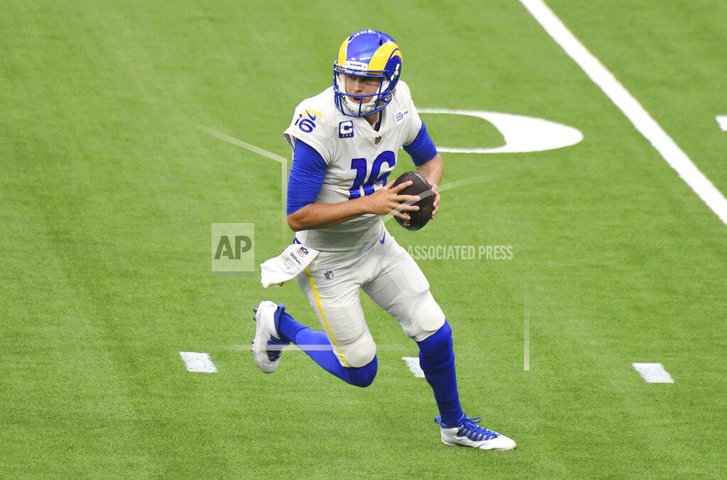 Quarterback Jared Goff (16) of the Los Angeles Rams prepares to pass against the Dallas Cowboys in the first half of a NFL football game on opening night at SoFi Stadium in Inglewood on Sunday, September 13, 2020. (Keith Birmingham/The Orange County Register via AP)