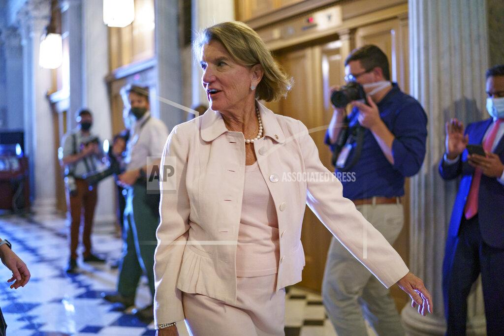 J. Scott Applewhite Sen. Shelley Moore Capito, R-W.Va., one of the key Senate Republicans shepherding a $1 trillion infrastructure bill with Democrats, arrives at the chamber as the Senate works to advance the $1 trillion bipartisan infrastructure bill, at the Capitol in Washington, Monday, Aug. 2, 2021. The 2,700-page bill includes new expenditures on roads, bridges, water pipes broadband and other projects, plus cyber security. (AP Photo/J. Scott Applewhite)