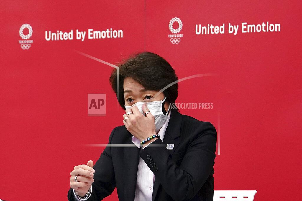 Seiko Hashimoto, president of the Tokyo 2020 Organizing Committee of the Olympic and Paralympic Games (Tokyo 2020), speaks during a news conference Thursday, March 11, 2021, after attending the International Olympic Committee (IOC) general meeting. (AP Photo/Eugene Hoshiko, Pool)