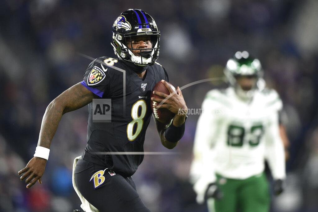 Gail Burton Baltimore Ravens quarterback Lamar Jackson (8) scrambles for yardage against the New York Jets during the first half of an NFL football game, Thursday, Dec. 12, 2019, in Baltimore. (AP Photo/Gail Burton)
