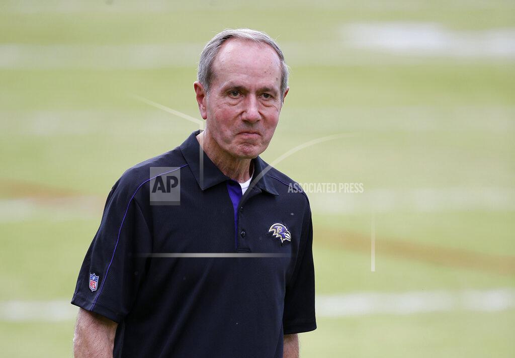 FILE - In this Aug. 1, 2015, file photo, Baltimore Ravens president Dick Cass walks off the field after NFL football training camp practice in Owings Mills, Md. At a time when America is trying to cope with the financial fallout created by the deadly coronavirus, the renewal of NFL season tickets is not exactly a high priority in the midst of soaring unemployment, business closures and a volatile stock market. “There’s a lot of people who are being incredibly affected by this crisis and may not have the funds available to complete the purchase of their season tickets," Ravens president Dick Cass said. “We’re dealing with a lot of season ticket holders who have been with us for 20 years and we don’t want to lose them. So we’re going to work with them, and hopefully we can find a solution that works for everybody."(AP Photo/Patrick Semansky, File)