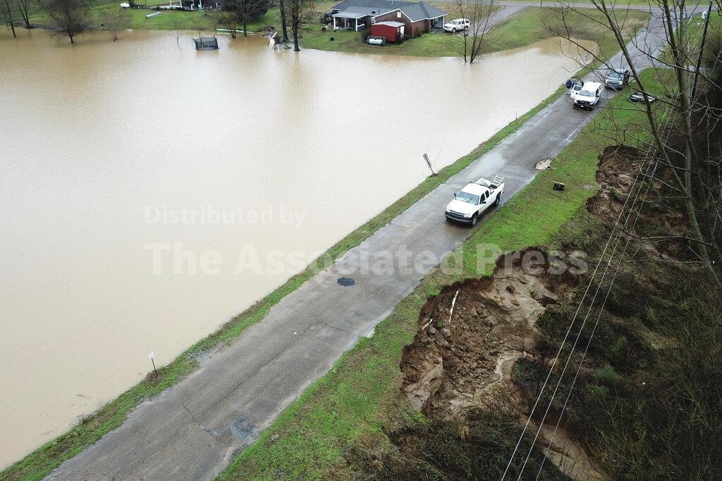 FILE - In this Feb. 11, 2020, file, aerial drone photo provided by the Mississippi Emergency Management Agency shows a potential dam/levee failure in the Springridge Place subdivision in Yazoo County, Miss. Heavy rains and recent flooding across the Southeastern U.S. have highlighted a potential public safety concern for some dams. An Associated Press review has identified hundreds of high hazard dams in the South that lack formal emergency action plans. (David Battaly/Mississippi Emergency Management Agency via AP, File)