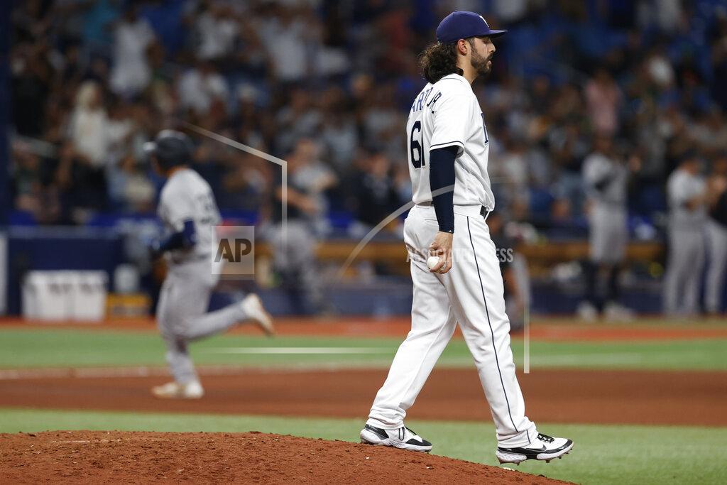 Scott Audette Tampa Bay Rays pitcher Ralph Garza Jr. walks on the mound after giving up a two-run home run to New York Yankees' Jose Trevino, left, during the eighth inning of a baseball game Wednesday, June 22, 2022, in St. Petersburg, Fla. (AP Photo/Scott Audette)