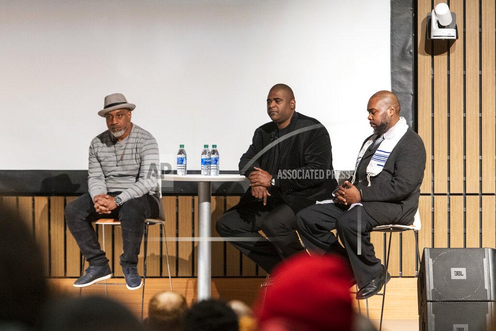 William Moore, left, Anthony Wilson, center, and Jeffrey Wilson, right, speak at a conversation and private screening of