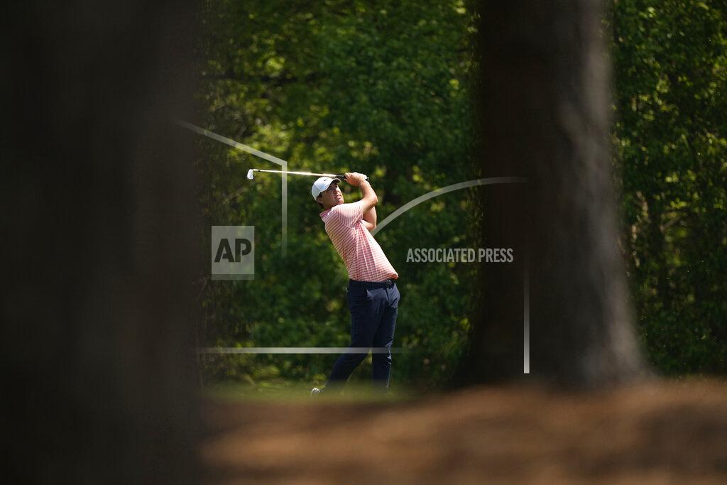 David J. Phillip Scottie Scheffler hits on the 11th fairway during a practice round for the Masters golf tournament on Wednesday, April 7, 2021, in Augusta, Ga. (AP Photo/David J. Phillip)