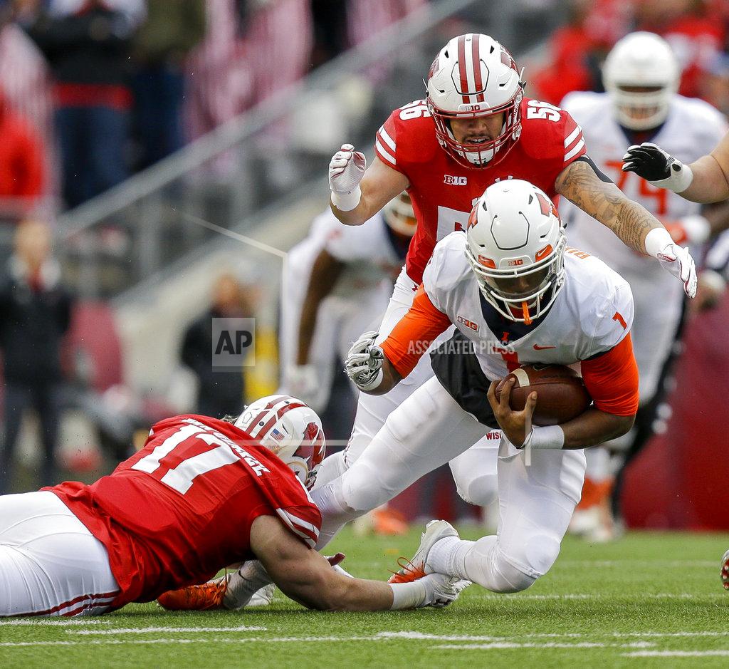 Andy Manis Wisconsin linebacker Andrew Van Ginkel (17) and linebacker Zack Baun tackle Illinois quarterback AJ Bush during the first half of an NCAA college football game Saturday, Oct. 20, 2018, in Madison, Wis. (AP Photo/Andy Manis)