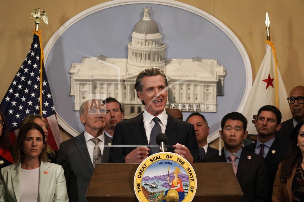 Rich Pedroncelli California Gov. Gavin Newsom discusses the recent mass shooting in Texas, during a news conference in Sacramento, Calif., Wednesday, May 25, 2022. Flanked by lawmakers from both houses of the state legislature, Newsom said he is ready to sign more restrictive gun measures passed by lawmakers.(AP Photo/Rich Pedroncelli)