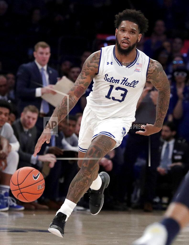 Julio Cortez Seton Hall guard Myles Powell drives against Georgetown during the first half of an NCAA college basketball game in the Big East men's tournament, Thursday, March 14, 2019, in New York. (AP Photo/Julio Cortez)